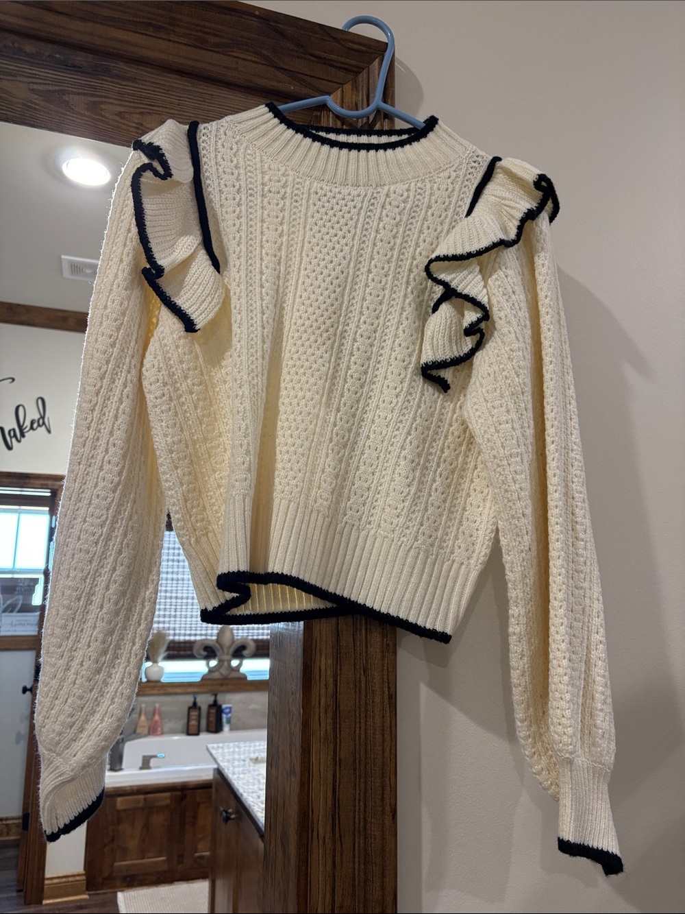 eesome Cream Cable Knit Sweater with Black Trim and Ruffles
